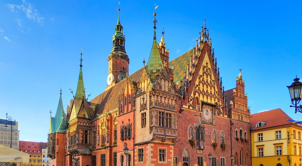 Photo of the town hall in Wrocław, framed against a blue sky. Made available to Wikipedia by Szczecinolog.